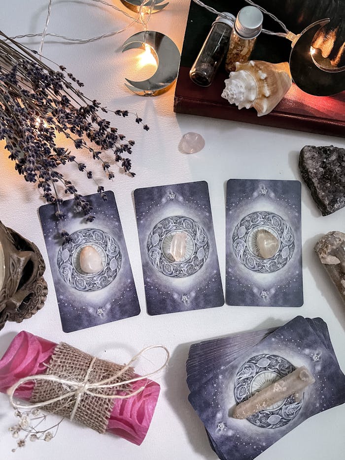 Purple and White Tarot Cards on White Surface